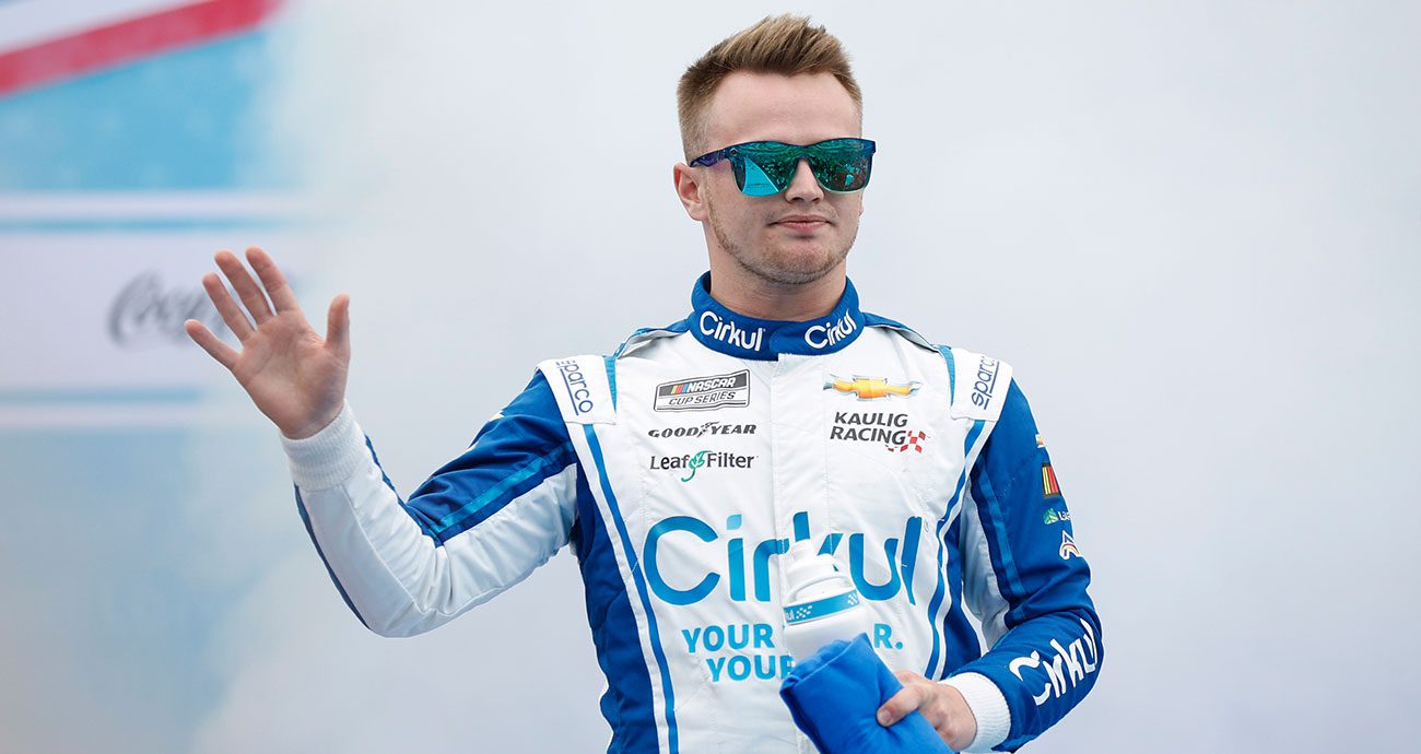 Justin Haley gives a wave during driver introductions at the Daytona 500