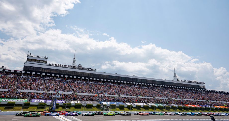 NASCAR Cup Series cars race at Pocono Raceway.