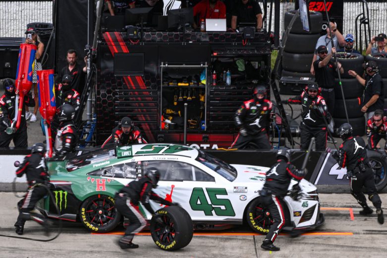 Tyler Reddick's No. 45 car gets work on pit road at Pocono Raceway.