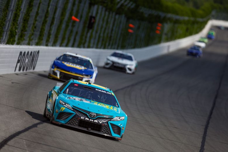 Denny Hamlin races at Pocono Raceway.