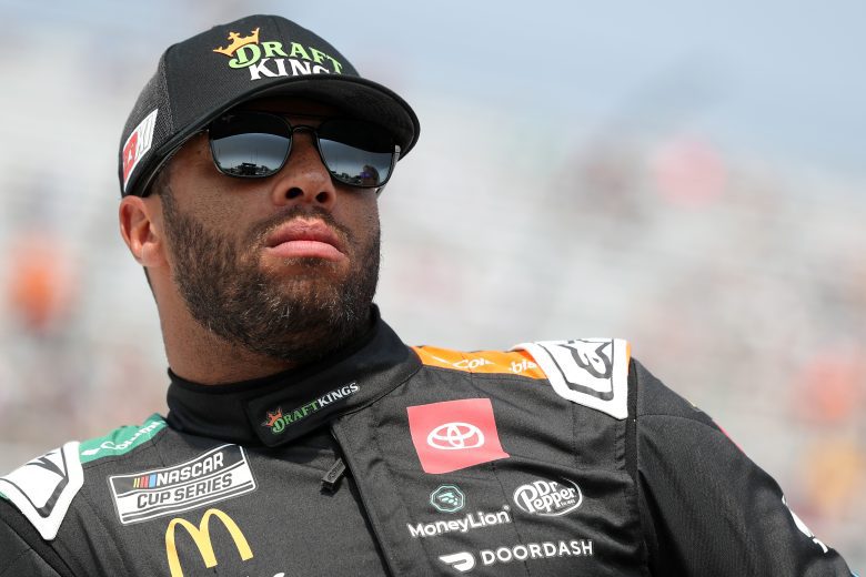 Bubba Wallace stands on pit road