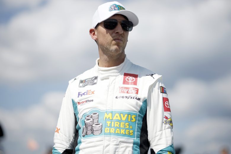 Denny Hamlin stands on pit road