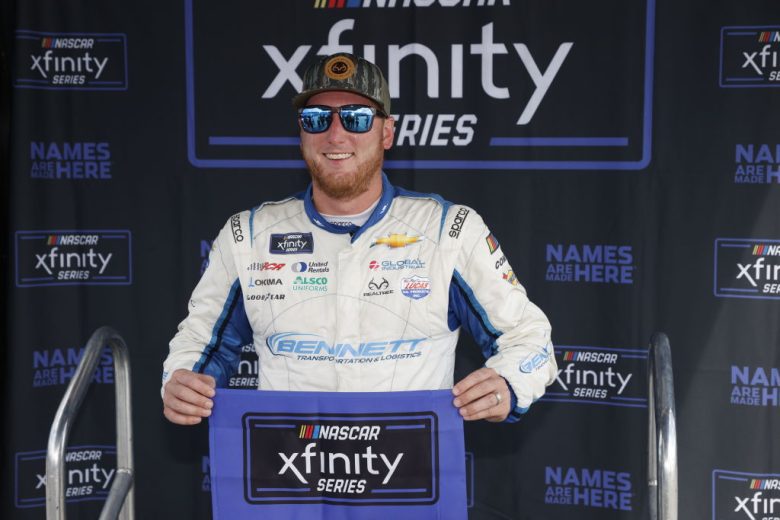 Austin Hill poses with pole award