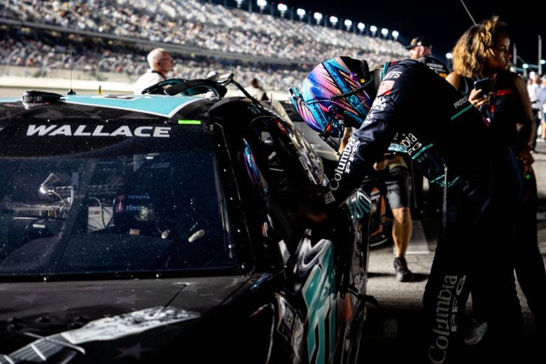 Bubba Wallace exits his car.