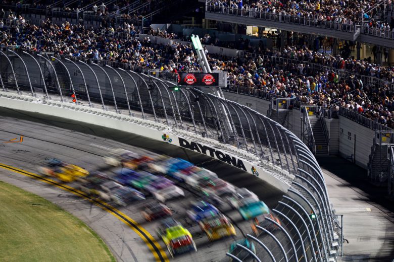 The pack racing through the tri-oval at Daytona.