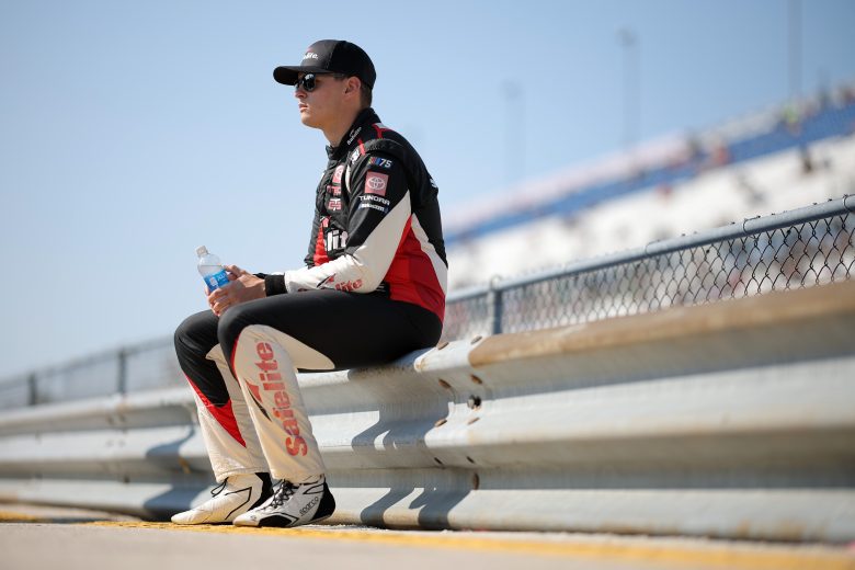 Corey Heim sits on the Milwaukee pit wall