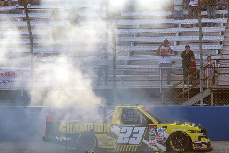 Grant Enfinger performs a burnout after winning at Milwaukee
