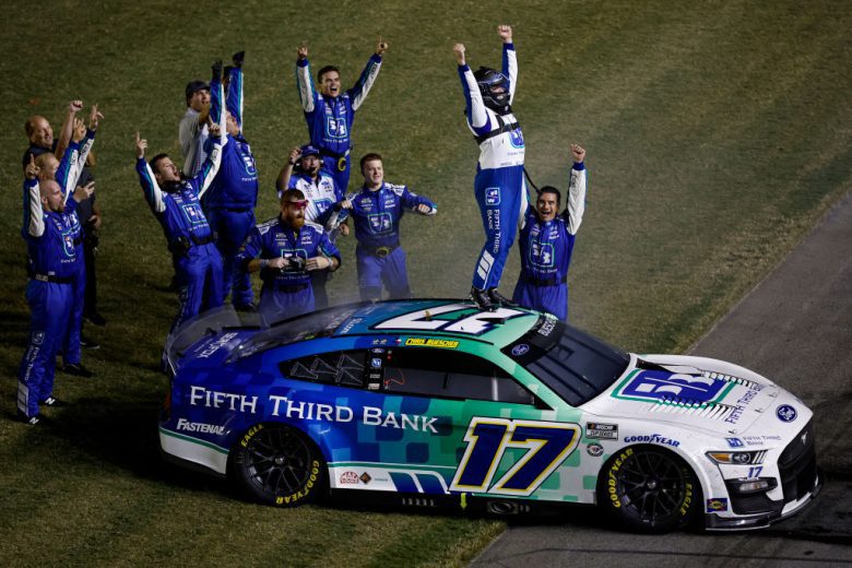 Chris Buescher celebrates atop his No. 17 Ford.
