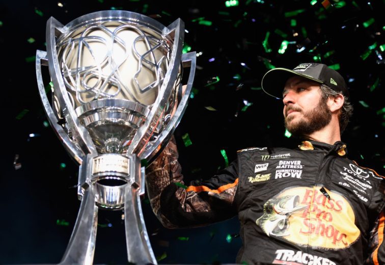 Martin Truex Jr. poses with trophy