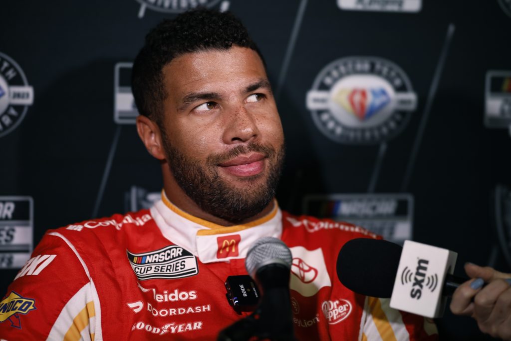 Bubba Wallace answers questions during NASCAR Playoffs Media Day