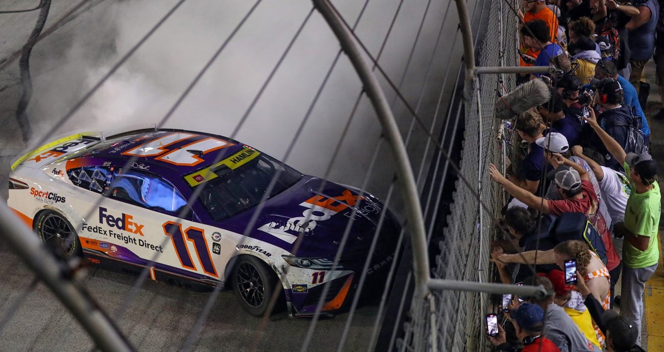Denny Hamlin performs a burnout at Bristol in front of the fans after winning the NASCAR Cup Series race
