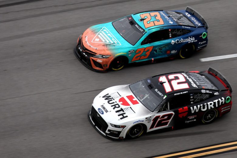 Bubba Wallace and Ryan Blaney race at Talladega.