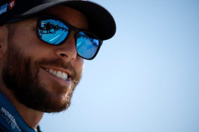 Ross Chastain looks on.