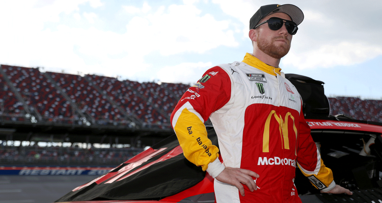 Tyler Reddick stands on the grid at Talladega