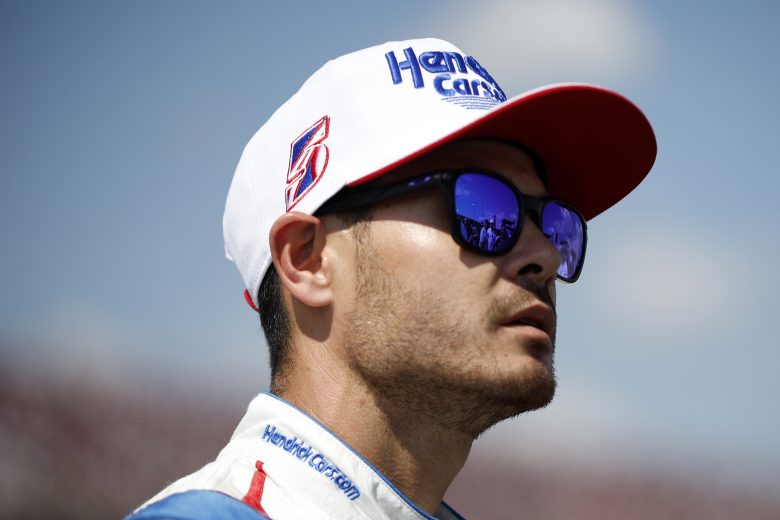 Kyle Larson waits on the grid