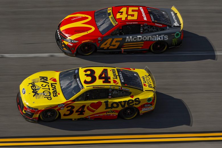 Michael McDowell and Tyler Reddick racing on track