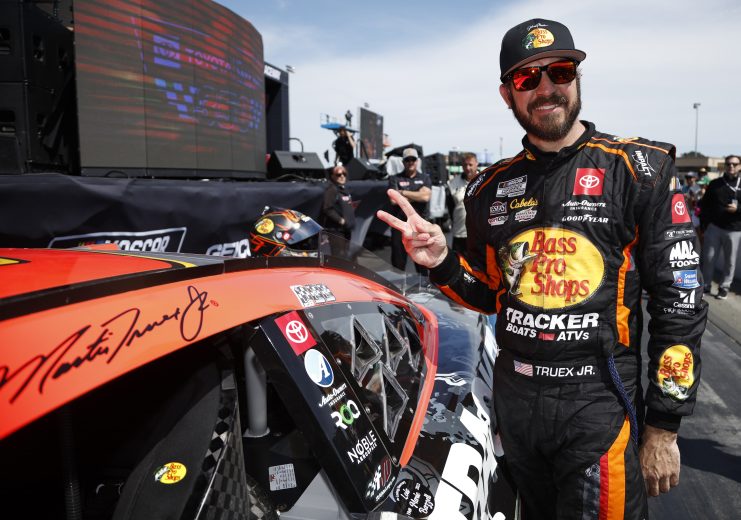 Martin Truex Jr. holds up two fingers after winning at Sonoma