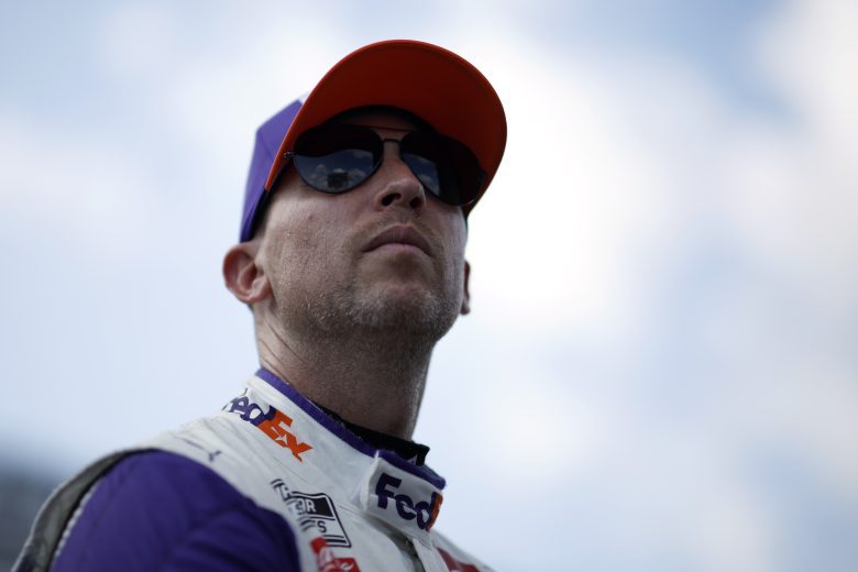 Denny Hamlin stands on pit road