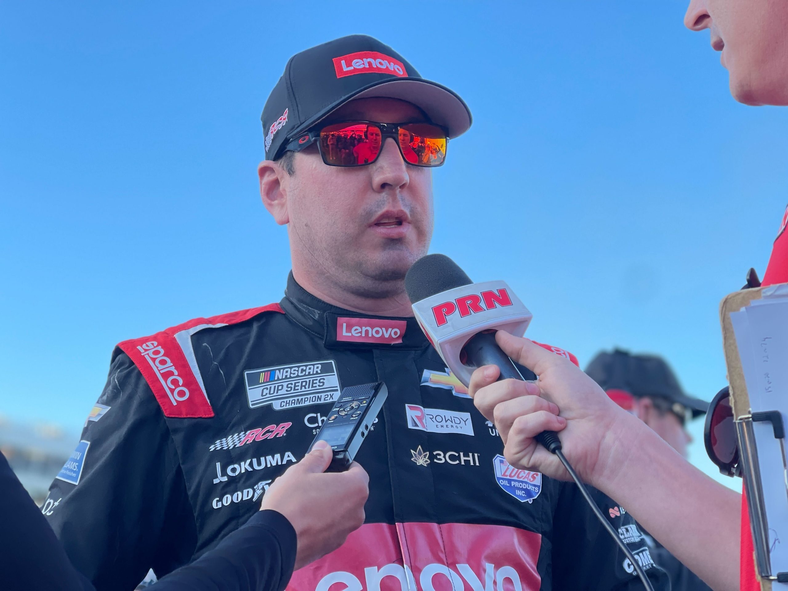 Kyle Busch speaks to reporters after the NASCAR Cup Series race at the Charlotte road course