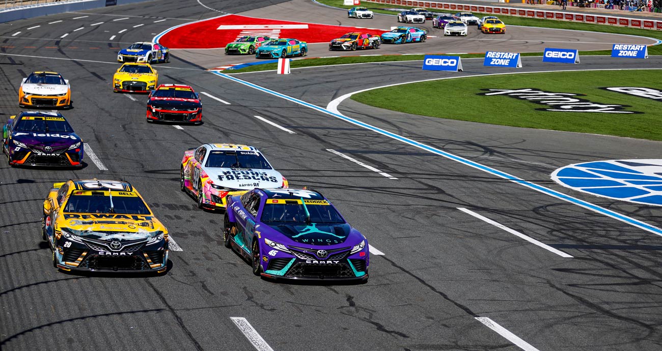 Tyler Reddick, Christopher Bell and Daniel Suárez race at the Charlotte Motor Speedway road course.