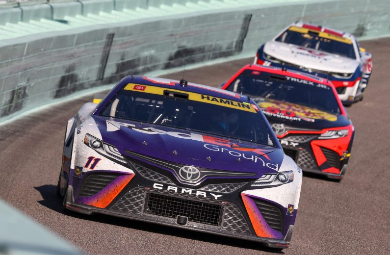 NASCAR Cars go around track during race