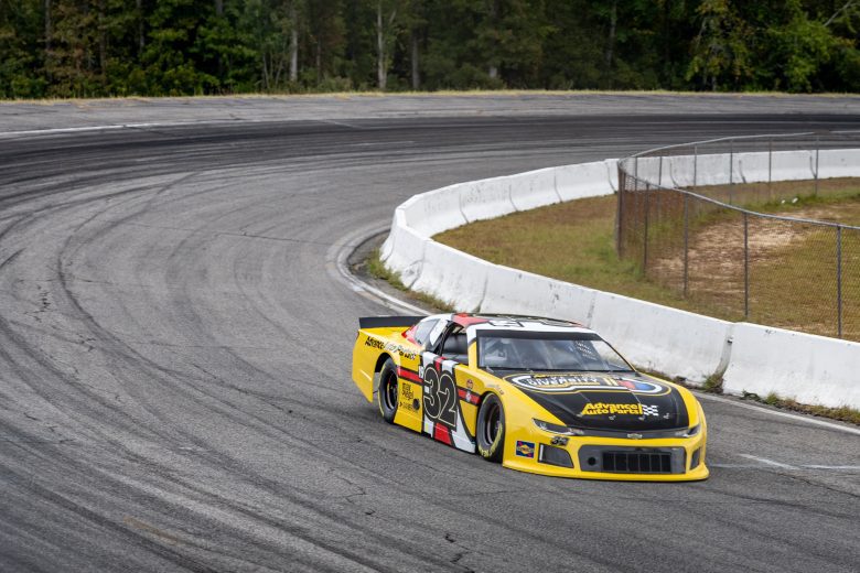 Lanie Buice driving a late model at the Advance Auto Parts Drive for Diversity Combine at Florence Motor Speedway