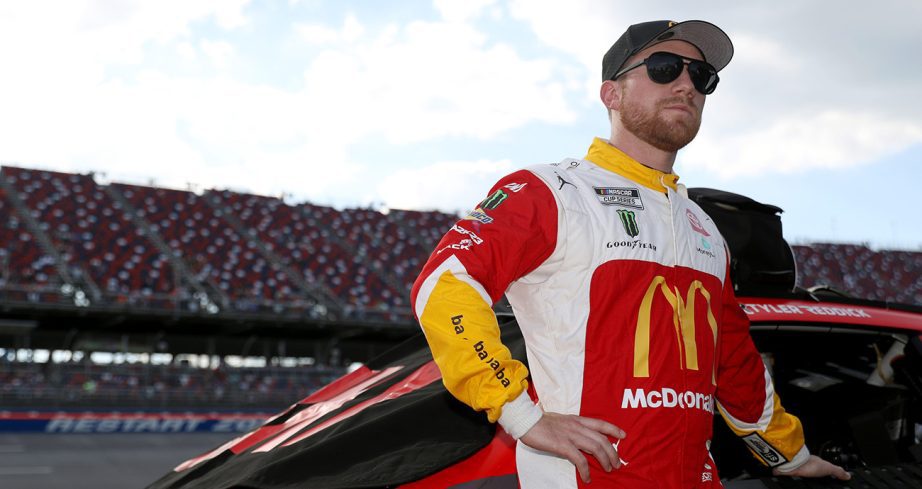 Tyler Reddick looks on