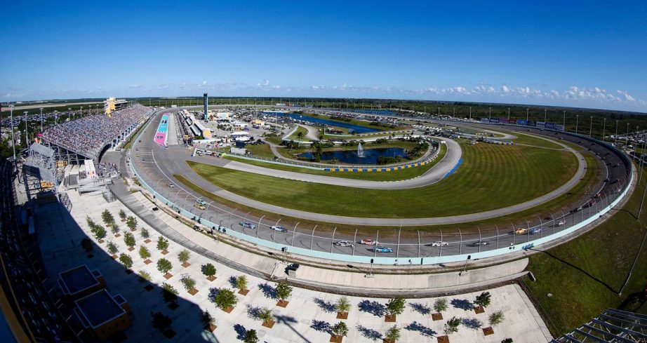 NASCAR Cup Series cars race at Homestead-Miami Speedway.