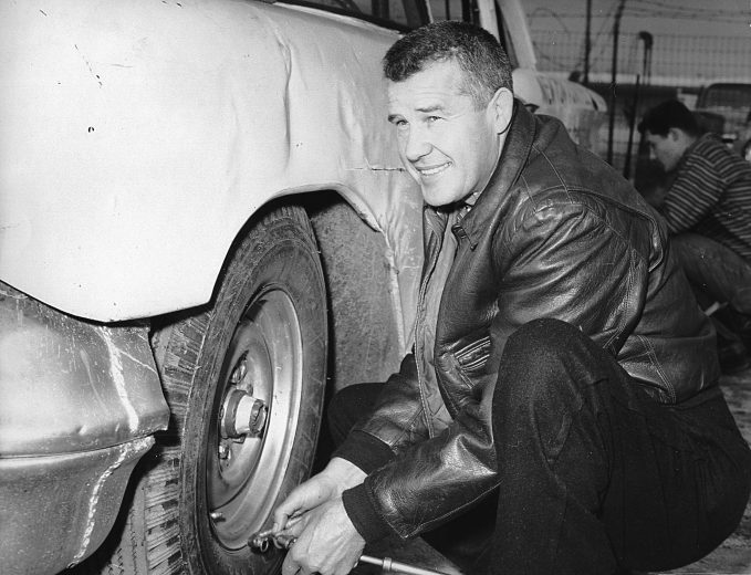 Lee petty working on car.