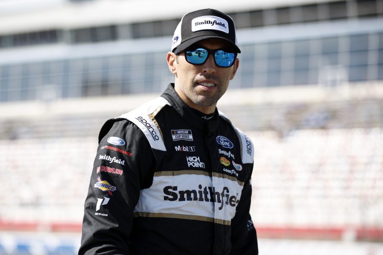 Aric Almirola walks the grid.
