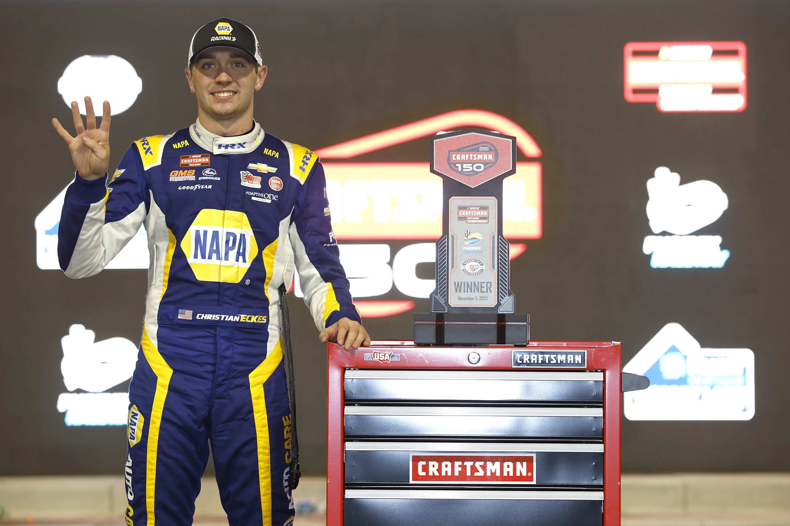 Christian Eckes, driver of the No. 19 NAPA Auto Care Chevrolet, celebrates in victory lane after winning the NASCAR Craftsman Truck Series Craftsman 150 at Phoenix Raceway.