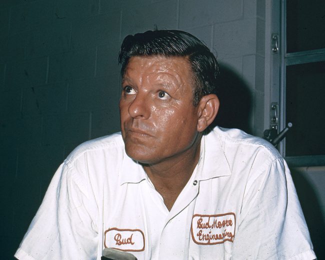 Bud Moore looks on.
