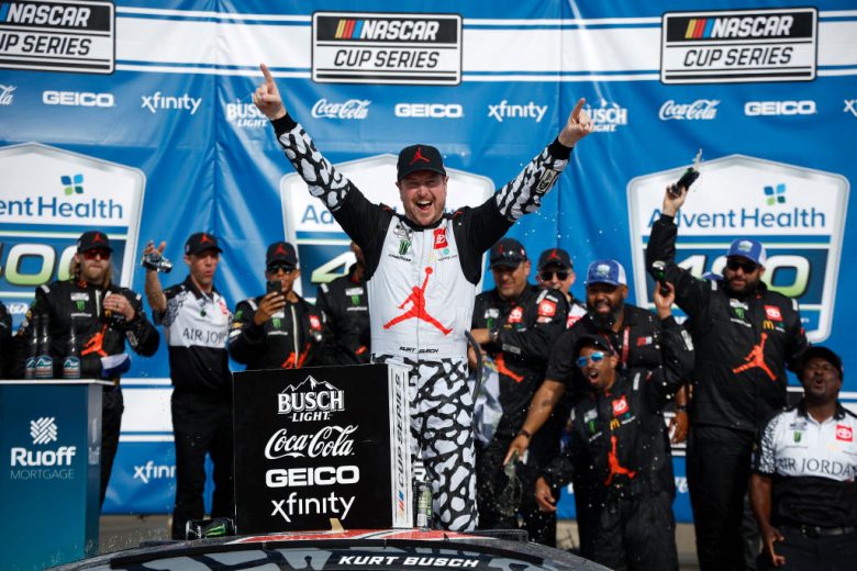 Kurt Busch celebrates in Victory Lane at Kansas Speedway.