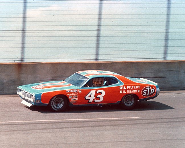 Richard Petty drives on the track.