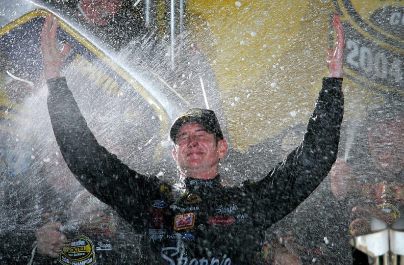 Kurt Busch celebrates his 2004 Cup Series title.