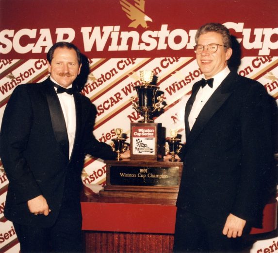 Dale Earnhardt celebrates his championship.