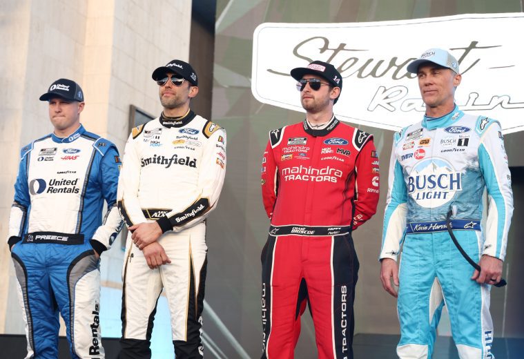 Ryan, Preece, Aric Almirola, Chase Briscoe, and Kevin Harvick on stage.
