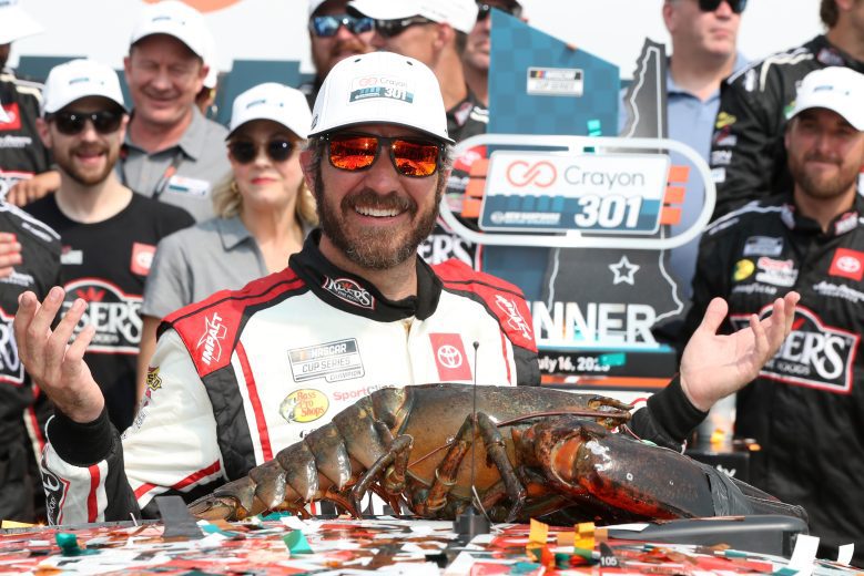 Martin Truex Jr. celebrates in Victory Lane.