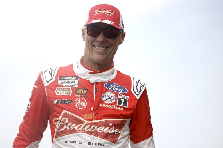 Kevin Harvick, driver of the #4 Budweiser Ford, walks onstage during driver intros prior to the NASCAR Cup Series 4EVER 400 Presented by Mobil 1 at Homestead-Miami Speedway on October 22, 2023 in Homestead, Florida.