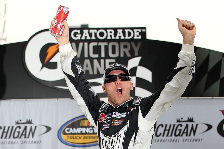 Kevin Harvick celebrates in Victory Lane at Michigan.