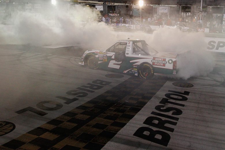Kevin Harvick does a burnout after winning at Bristol.