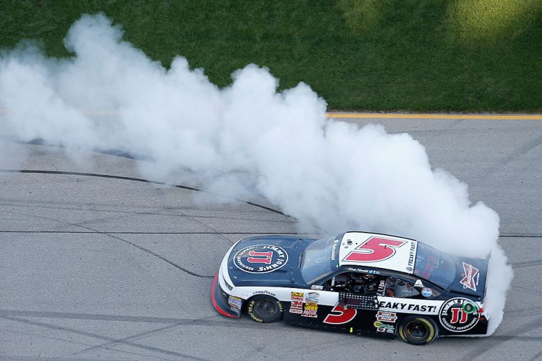 Kevin Harvick celebrates after winning at Chicagoland Speedway.