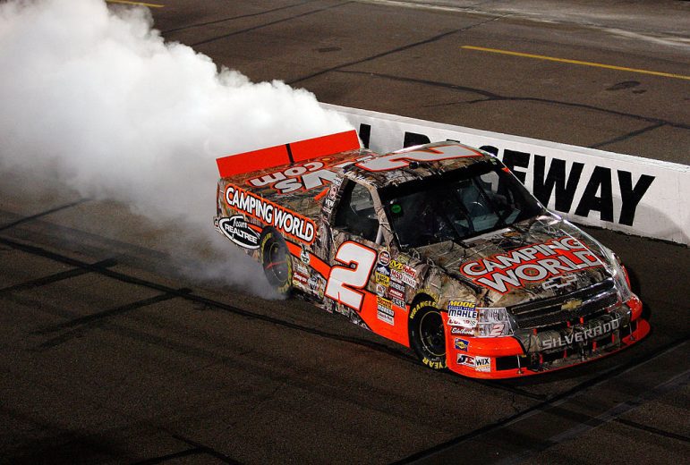 Kevin Harvick does a burnout after winning at Phoenix.
