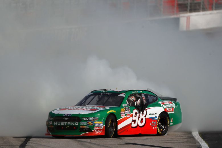 Kevin Harvick celebrates after winning at Atlanta.
