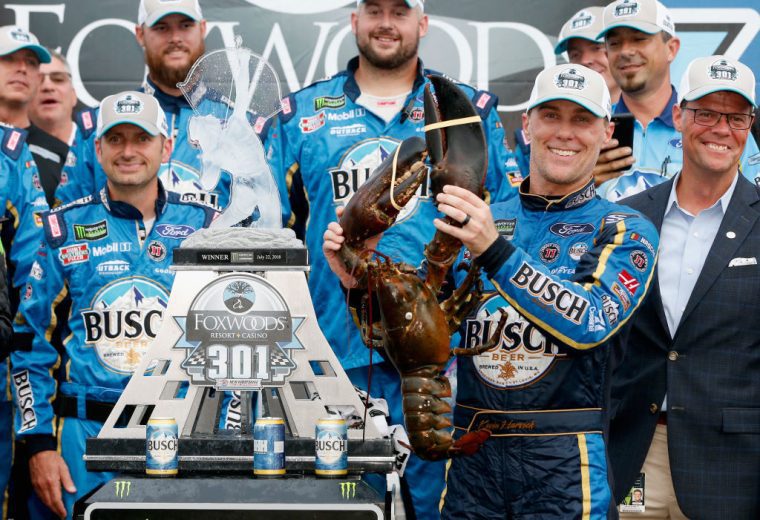 Kevin Harvick celebrates in Victory Lane at New Hampshire.