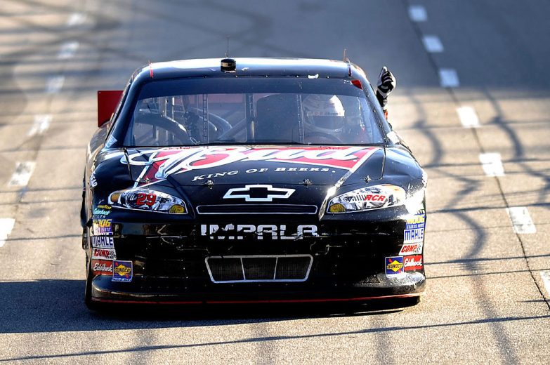 Kevin Harvick celebrates after winning at Martinsville.