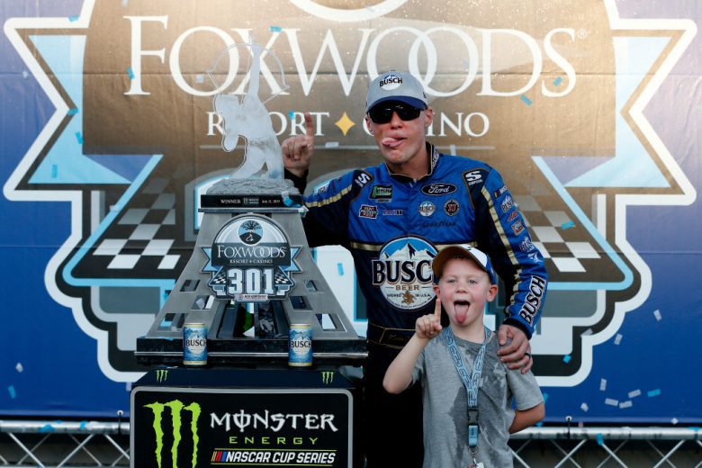 Kevin Harvick celebrates in Victory Lane at New Hampshire.