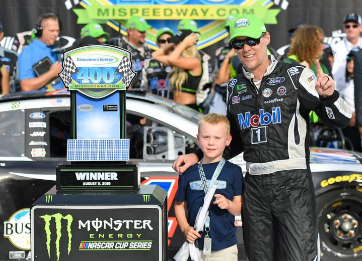 Kevin Harvick celebrates in Victory Lane at Michigan.