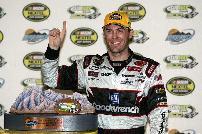 Kevin Harvick celebrates in Victory Lane after winning at Phoenix.
