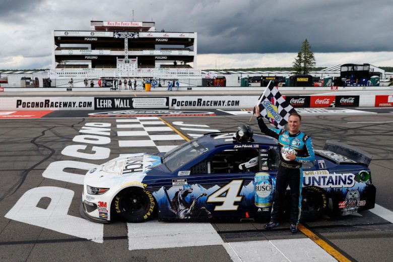Kevin Harvick celebrates after winning at Pocono.